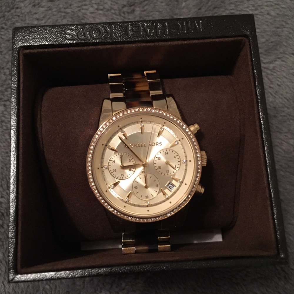 Gold and tortoise watch with rinestones